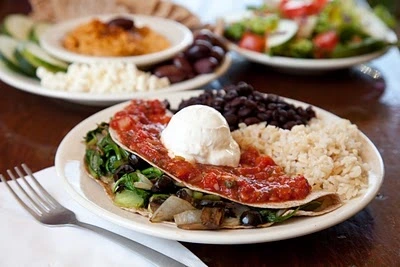 Quesadilla with salsa, sour cream, beans, and rice